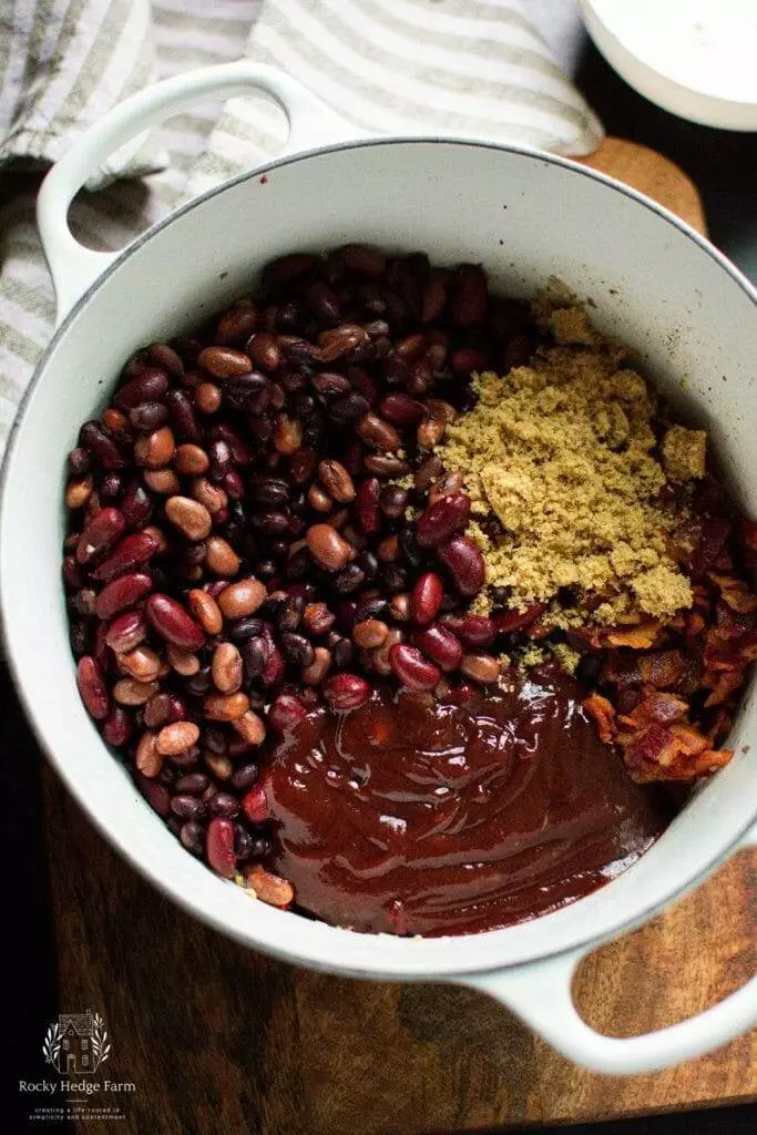 Cooking Up a Batch of Cowboy Beans in a White Dutch Oven