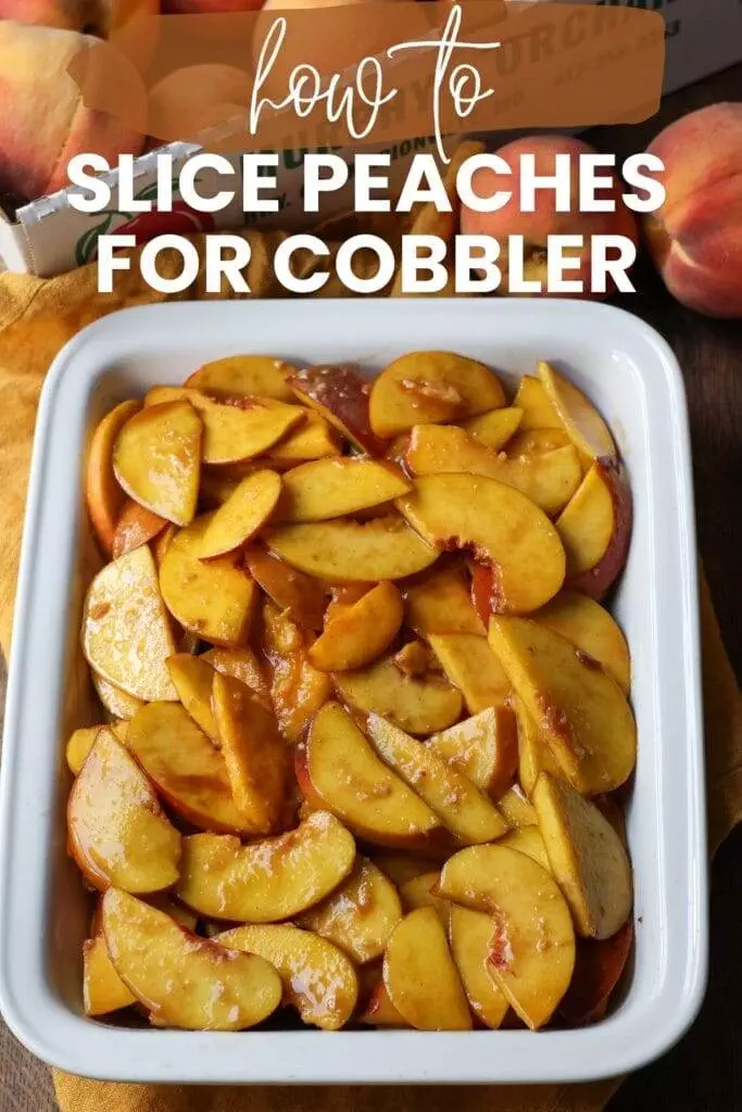 White platter filled with sliced peaches for a cobbler