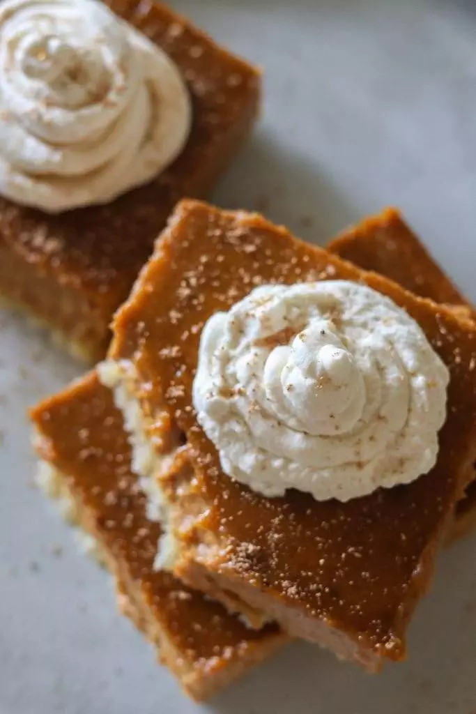 Creamy pumpkin pie bars with a golden shortbread crust,